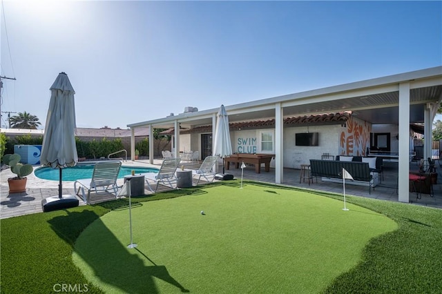 exterior space with a patio area and a swimming pool