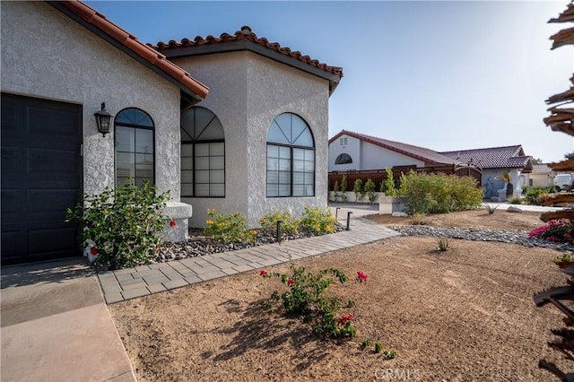 exterior space with a garage