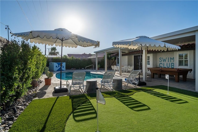 view of swimming pool featuring a patio area