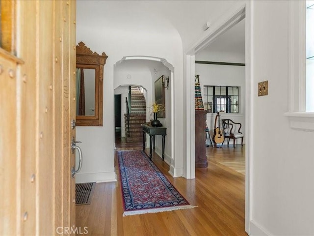 hallway featuring hardwood / wood-style flooring