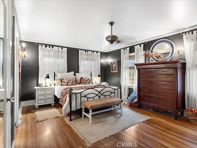 bedroom featuring hardwood / wood-style floors