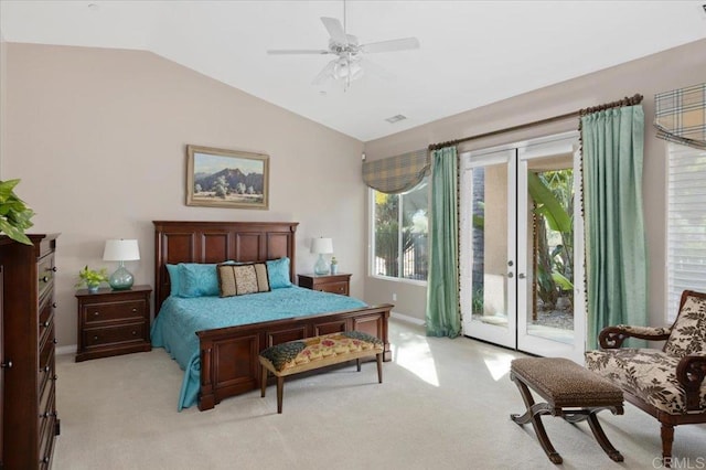 bedroom featuring access to exterior, vaulted ceiling, light colored carpet, and ceiling fan