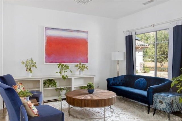 living area featuring hardwood / wood-style flooring