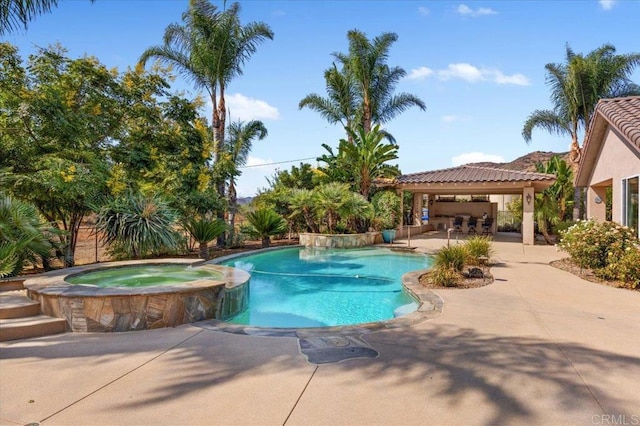 view of pool featuring an in ground hot tub, a gazebo, and a patio