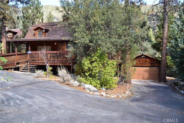 cabin featuring a garage