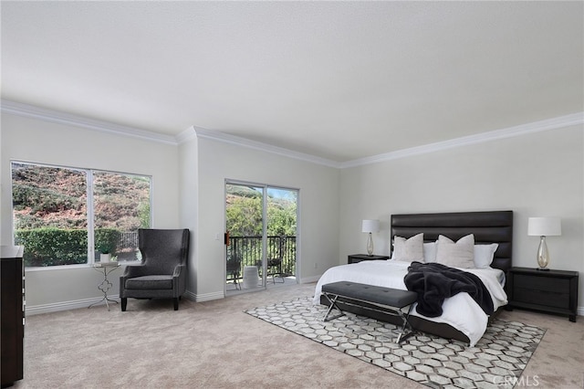 carpeted bedroom featuring crown molding and access to outside