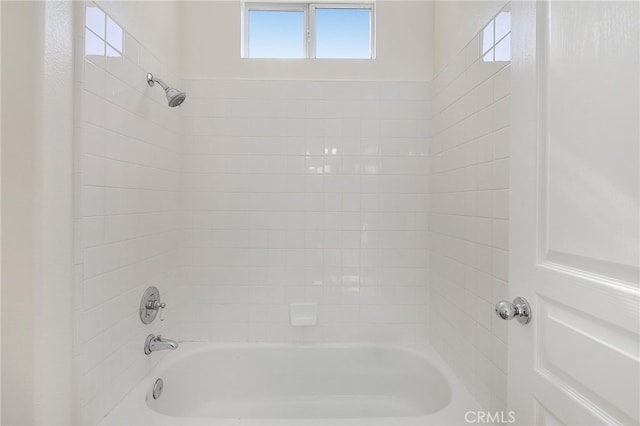 bathroom with shower / bathtub combination