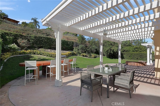 view of patio / terrace featuring an outdoor bar and a pergola