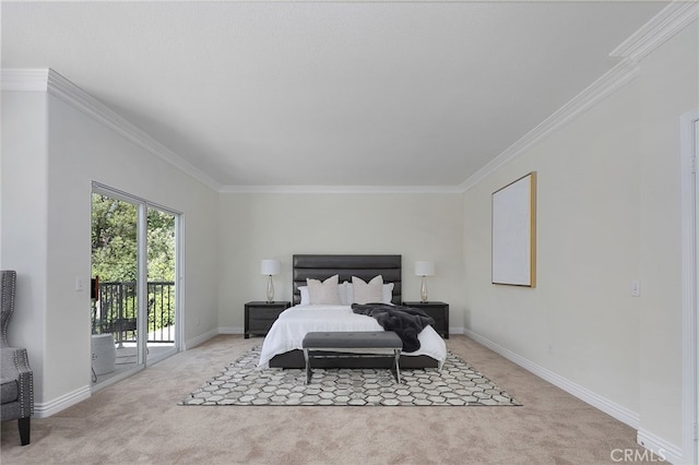 carpeted bedroom with ornamental molding and access to outside