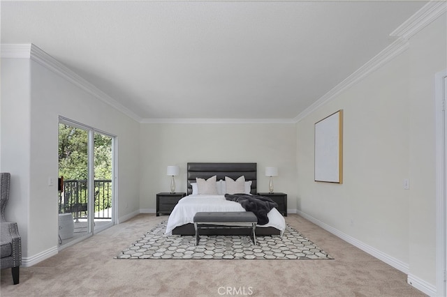 carpeted bedroom with ornamental molding and access to outside