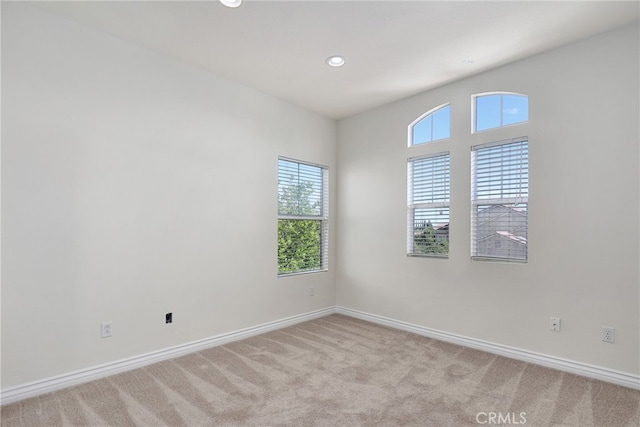 view of carpeted spare room