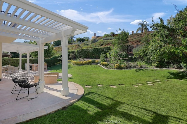 view of yard featuring a pergola and a patio area