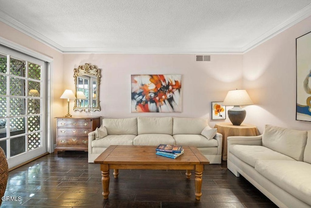 living room with a textured ceiling, ornamental molding, and dark hardwood / wood-style flooring