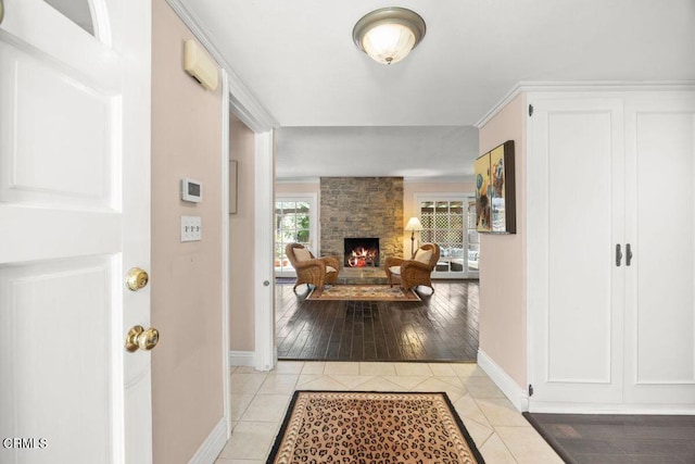 hall with light tile patterned flooring