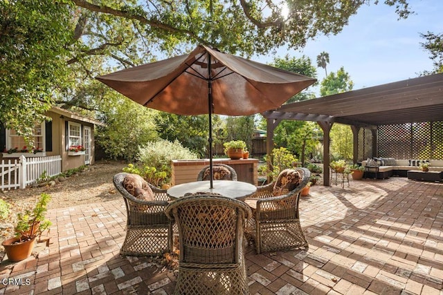 view of patio / terrace with a pergola and outdoor lounge area