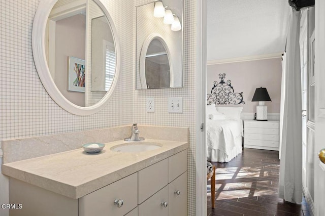617 Pleasant Ave, Ojai, CA 93023 - bathroom featuring vanity, ensuite bathroom, and wood finished floors
