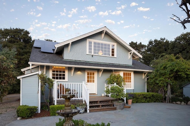 view of front of home featuring solar panels