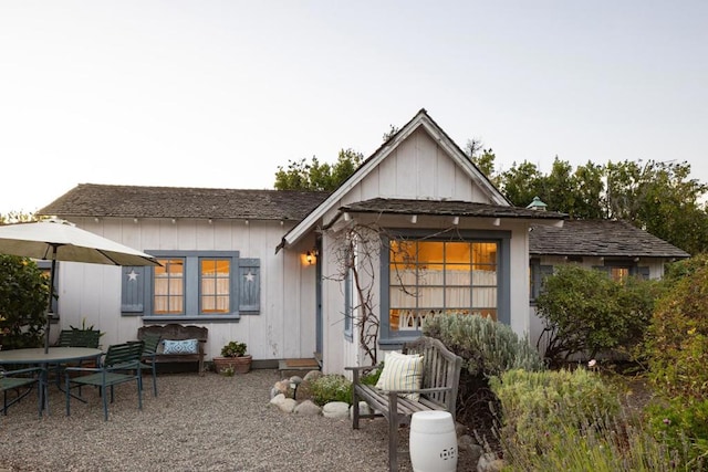 rear view of property with an outdoor hangout area and a patio