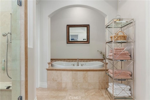 26088 Calle Catrina, Temecula, CA 92590 - bathroom featuring a shower stall, a bath, and tile patterned flooring