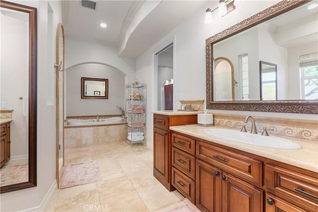 26088 Calle Catrina, Temecula, CA 92590 - bathroom featuring ornamental molding, vanity, a garden tub, and recessed lighting