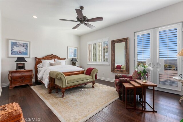 bedroom featuring dark wood-type flooring and ceiling fan