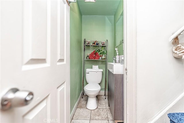 bathroom with tile patterned floors and toilet