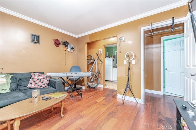 living room featuring crown molding and wood-type flooring