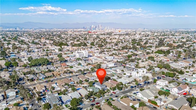 drone / aerial view featuring a mountain view