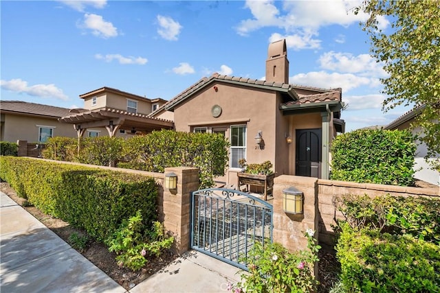 view of front of house featuring a pergola