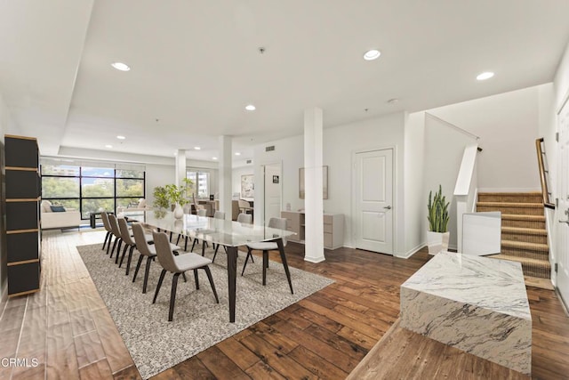 dining room with wood-type flooring