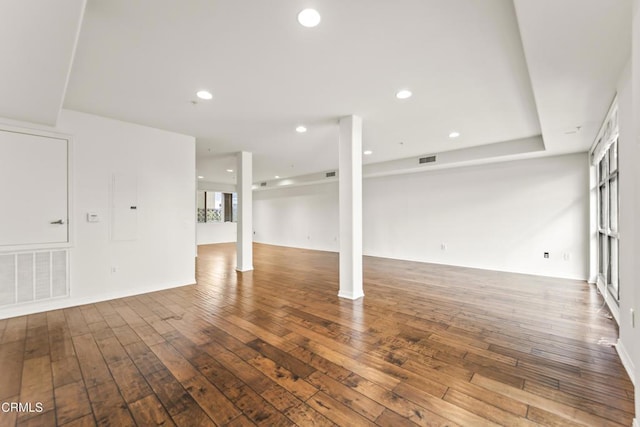 basement with hardwood / wood-style floors