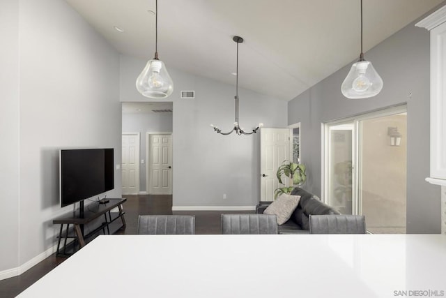 bedroom featuring high vaulted ceiling and dark hardwood / wood-style flooring