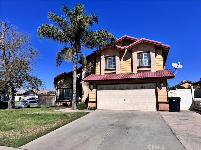 view of front of property with a front yard and a garage