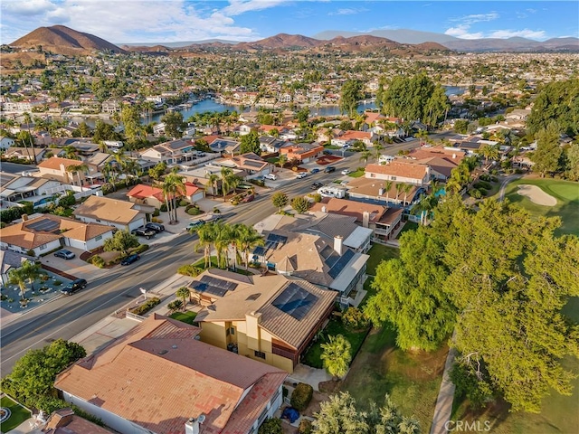 birds eye view of property featuring a mountain view