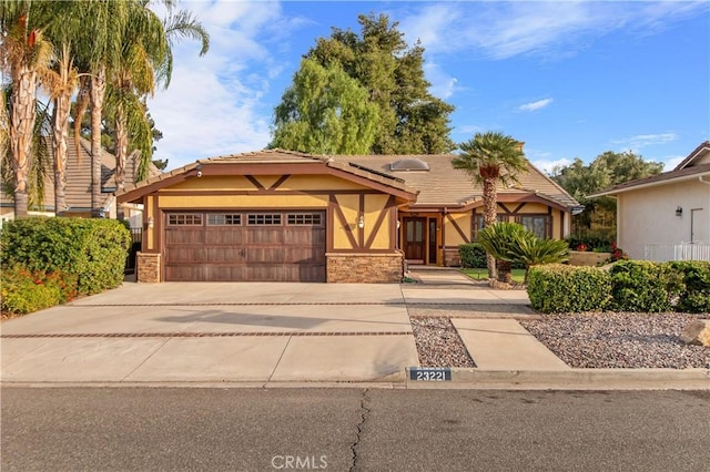 view of front of property featuring a garage