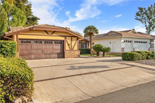 view of front of property featuring a garage