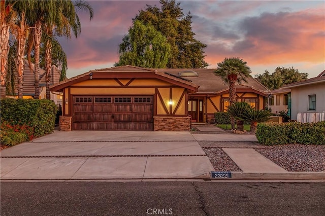 view of front of property featuring a garage