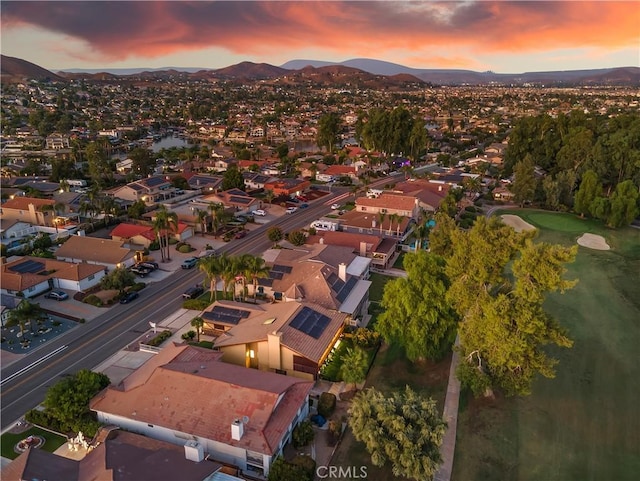 aerial view at dusk with a mountain view