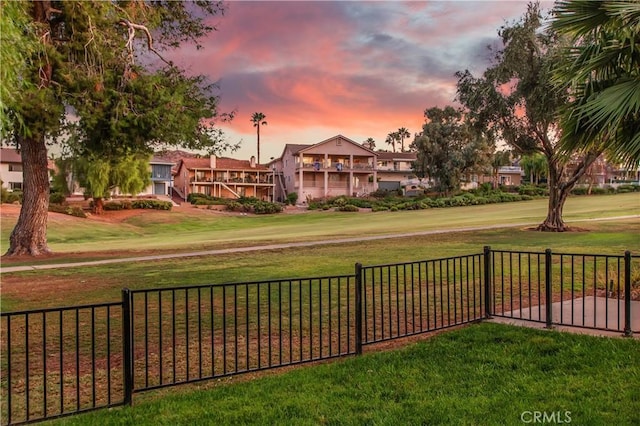 surrounding community featuring a lawn