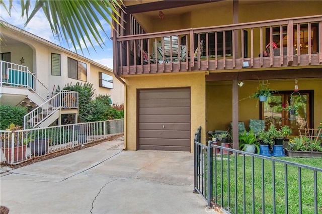 view of front of home with a garage and a front lawn