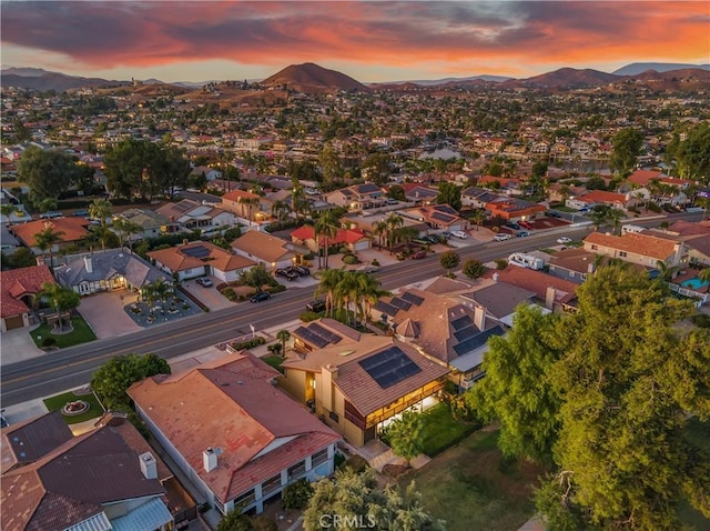 aerial view at dusk with a mountain view