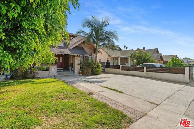 view of front of property with a front lawn