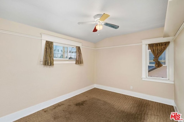 unfurnished room with carpet and ceiling fan