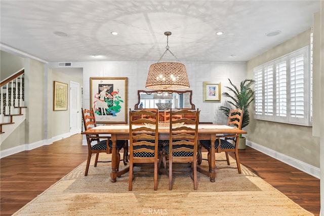 dining area featuring dark hardwood / wood-style floors