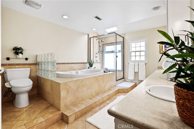 full bathroom with vanity, tile patterned flooring, toilet, and separate shower and tub