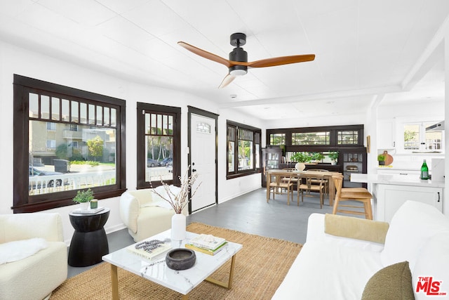 living room featuring ceiling fan