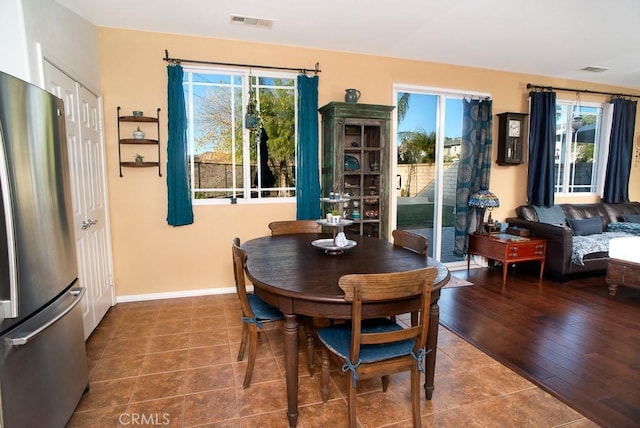 dining area featuring tile patterned floors