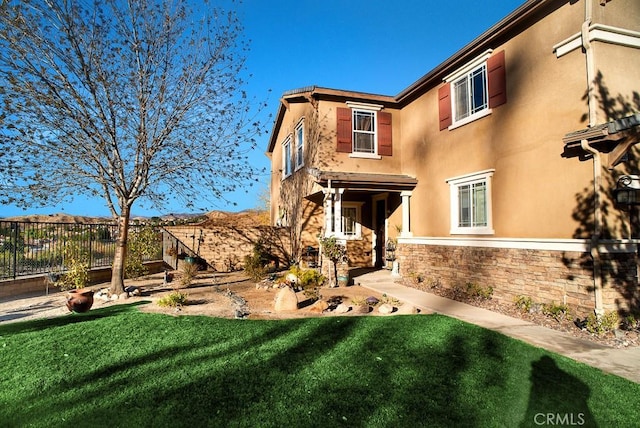 view of front of house with a front yard