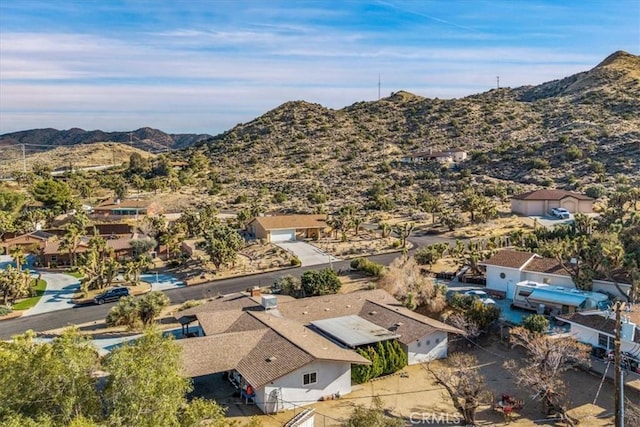 bird's eye view with a mountain view