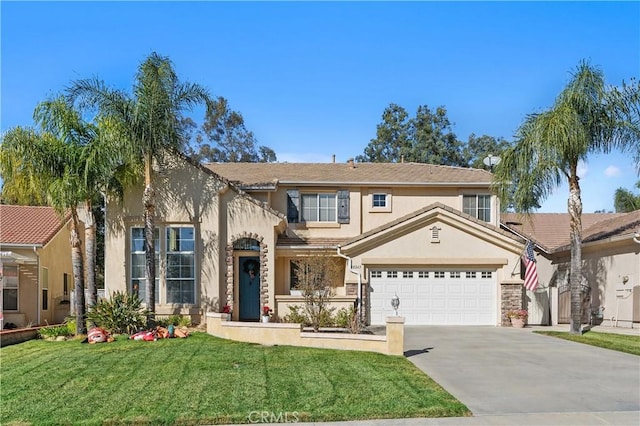 view of front of house featuring a garage and a front yard